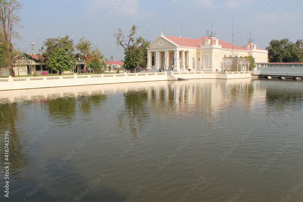 river and building at the royal palace in bang pa-in in thailand