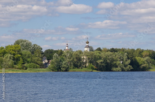 View of Lake Seliger and the Zhitny Peninsula and the Church of St. John the Theologian and St. Andrew the First-Called in the Bogoroditsky Zhitenny convent. The city of Ostashkov, Tver region, Russia