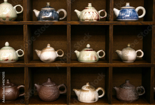 Old teapot on the shelf