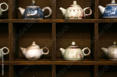 Old teapot on the shelf