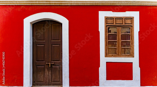 Red wall of house in fontainhas Panjim Goa. photo