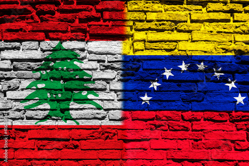 Flag of Lebanon and Venezuela on brick wall