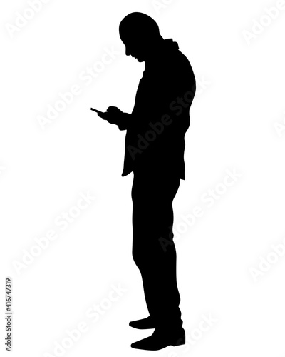 Man in a business suit is talking on a cell phone. Isolated silhouettes on a white background