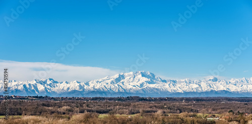The snow-capped Monte Rosa chain on a sunny morning in winter..View of the Lombard Alps. photo