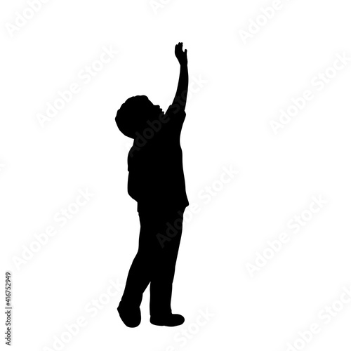 Silhouette little boy pull his hand up