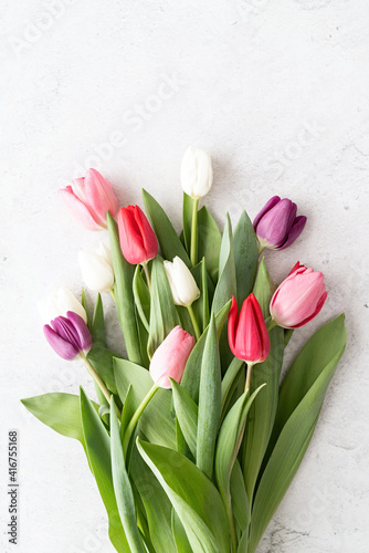 tulip bouquet on white concrete background