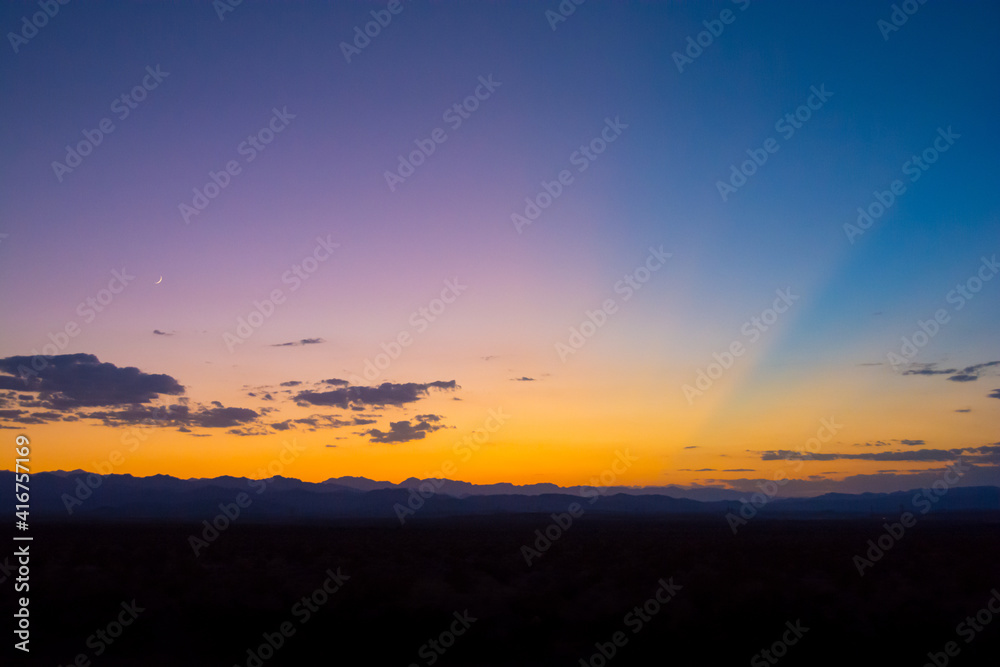 dusk with purple-orange-blue sky over Nevada desert, USA