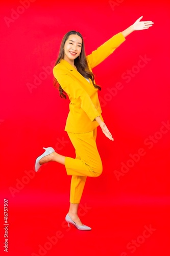 Portrait beautiful young business asian woman smile with action