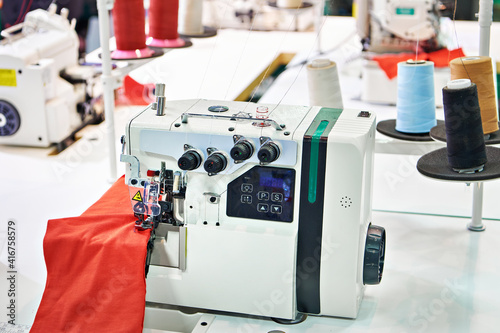 Two-needle, four-thread automatic overlock machine photo