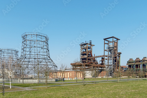 Altes Stahlwerk und Kühlturm-Silhoulette, Phoenix-West in Dortmund-Hörde, Nordrhein-Westfalen photo