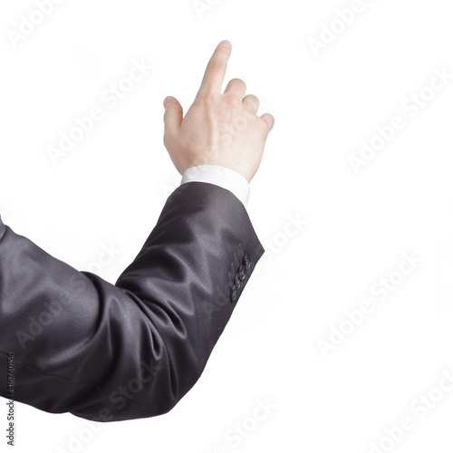 rear view. hand of a businessman pointing at a copy space