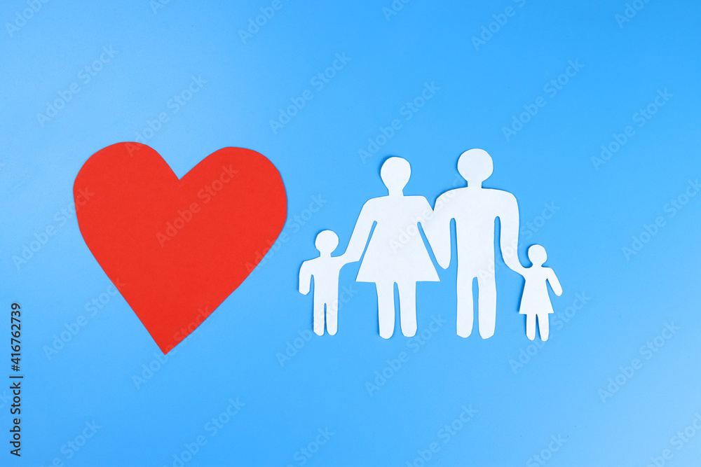 Paper family and heart. Love and family concept Paper family and heart. Love and family concept