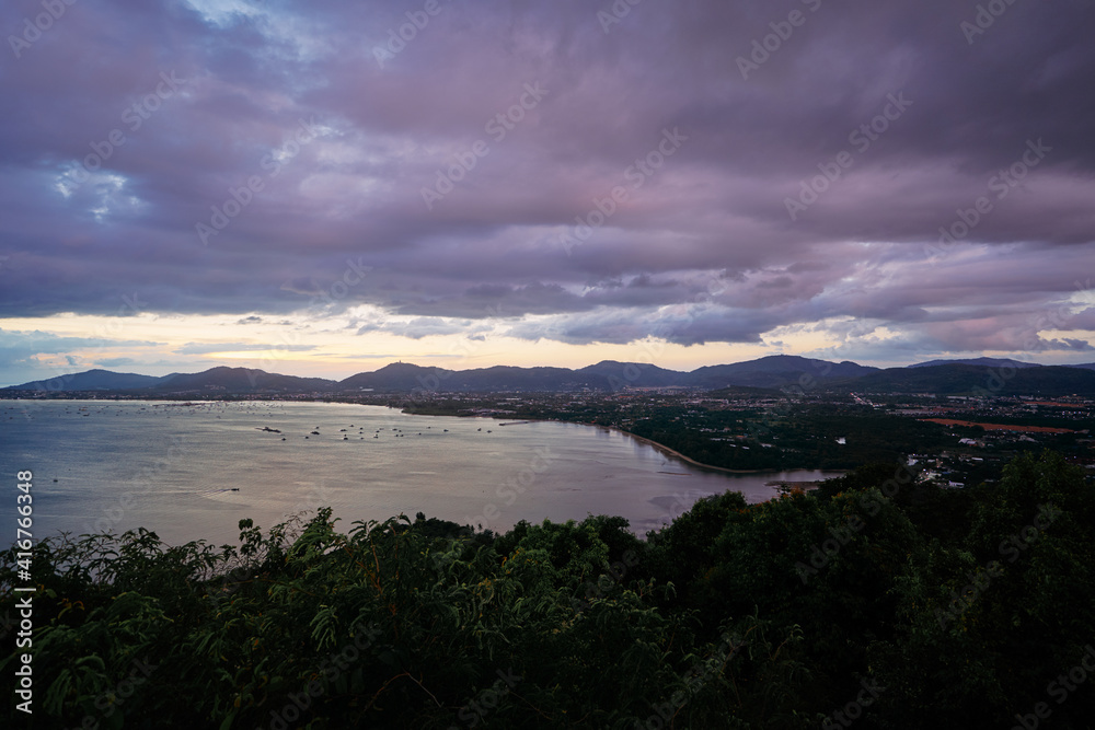 Before storm. Beautiful landscape with sea view and cloudy sky in sunset time.