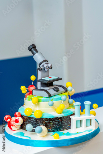 Cake in the form of a microscope..