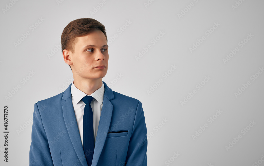 Man blue jacket tie manager official Professional gray background Man blue jacket tie manager official Professional gray background