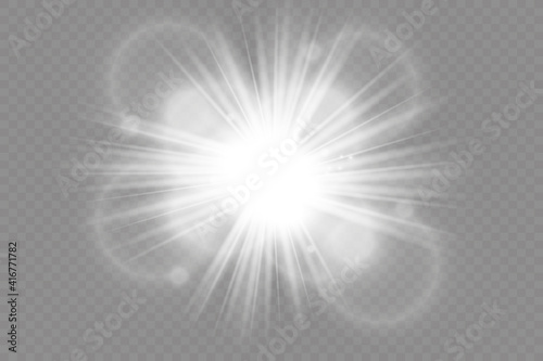 Yellow glowing light explodes on a transparent background. Sparkling magical dust particles. Bright Star. Transparent shining sun, bright flash. Vector sparkles. To center a bright flash.