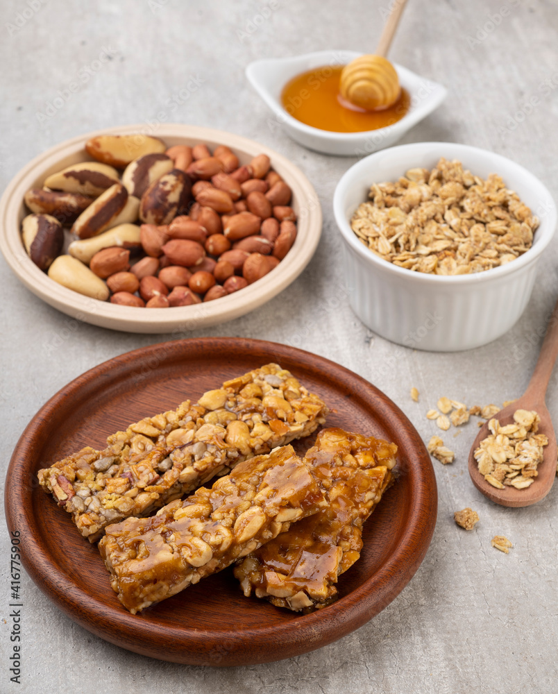 Homemade cereal bars with nuts, muesli and honey Homemade cereal bars with nuts, muesli and honey
