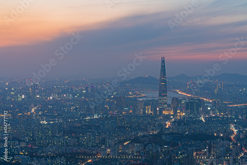 Seoul  South Korea Cityscape at Sunset. Photo shows Lotte Tower and Namsan Tower in the background.