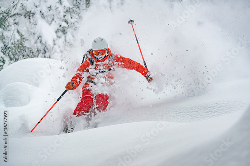 A male skier seen in powder snow in Zauchensee, Austria.
