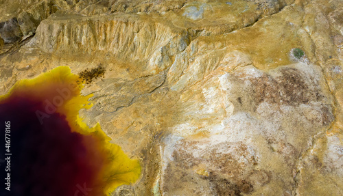 Aerial view of abandoned opencast copper mine in Sia, Cyprus. Unusual colors derives from massive sulfide deposits in the area