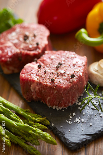 raw beef steak with vegetables