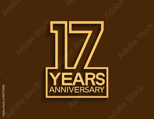 17 years anniversary design line style with square golden color isolated on brown background can be use for special moment celebration photo