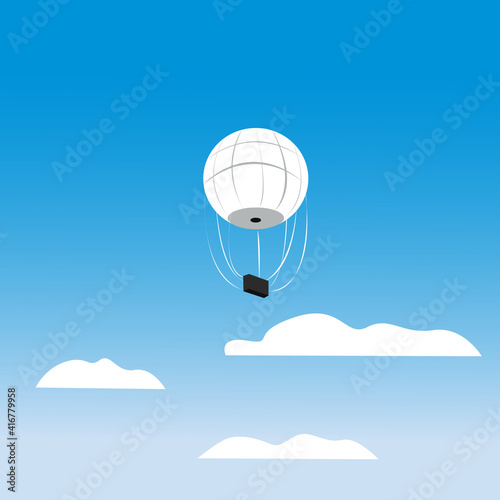 Aerostat is flying in the sky with clouds