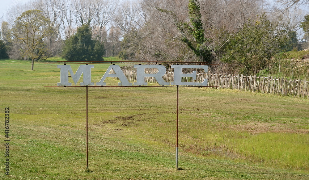Field with sign mare - sea archeological site fiumicino Field with sign mare - sea archeological site fiumicino