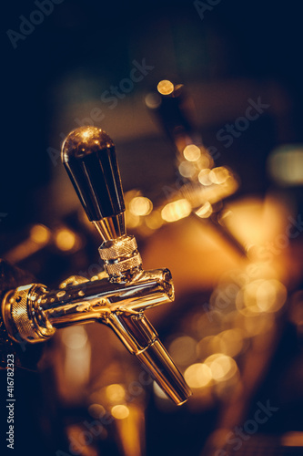 Close up shot of a beer tap in a bar.