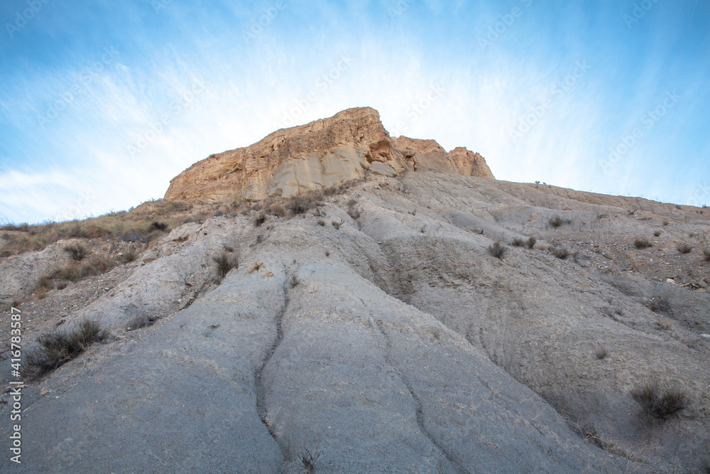 sandstone hilll and blue sky background in the Tabernas desert Spain