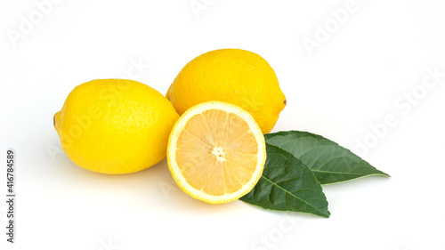 Fresh yellow lemon on a white background.