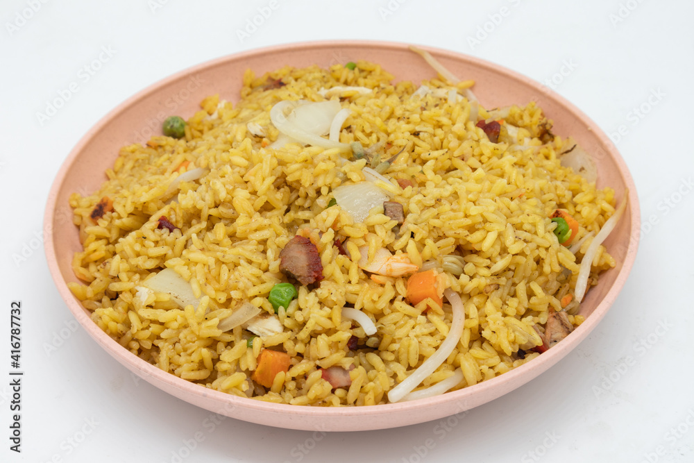 Homemade Chinese Style Fried Rice with Meat on a Pink Plate Homemade Chinese Style Fried Rice with Meat on a Pink Plate