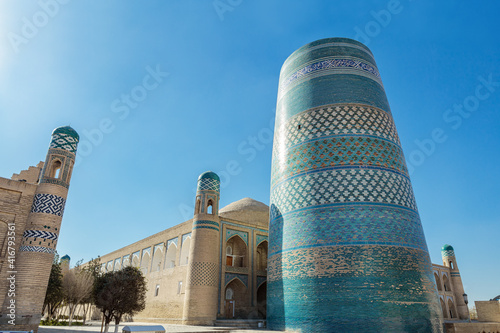 The ancient Kalta Minor tower of the Madrasah of Muhammad Aminhon in Khiva, Uzbekistan