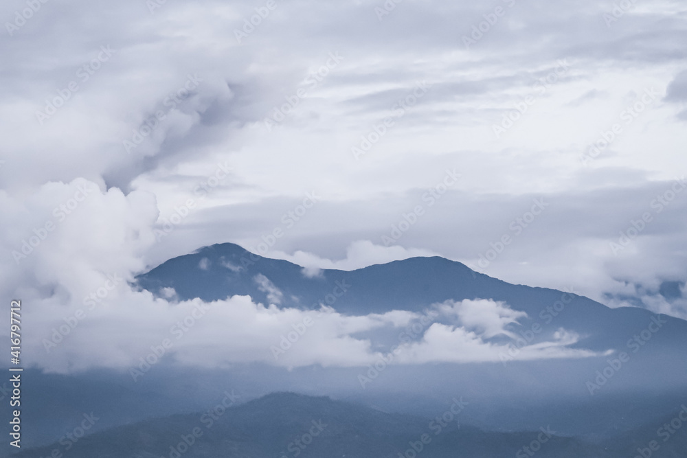 clouds over mountains