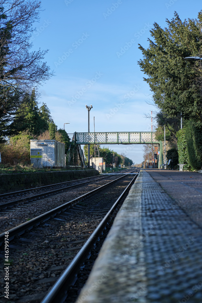 Trimley station platform, looking towards the level crossing & foot bridge.