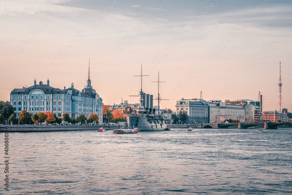 Cruiser Aurora view from the Neva river in the evening. The battleship sparkled Great October Communist Revolution in 1917.
