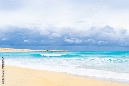 Turquoise Mediterranean sea at El Alamein near Alexandria, Egypt, with storm clouds gathering photo