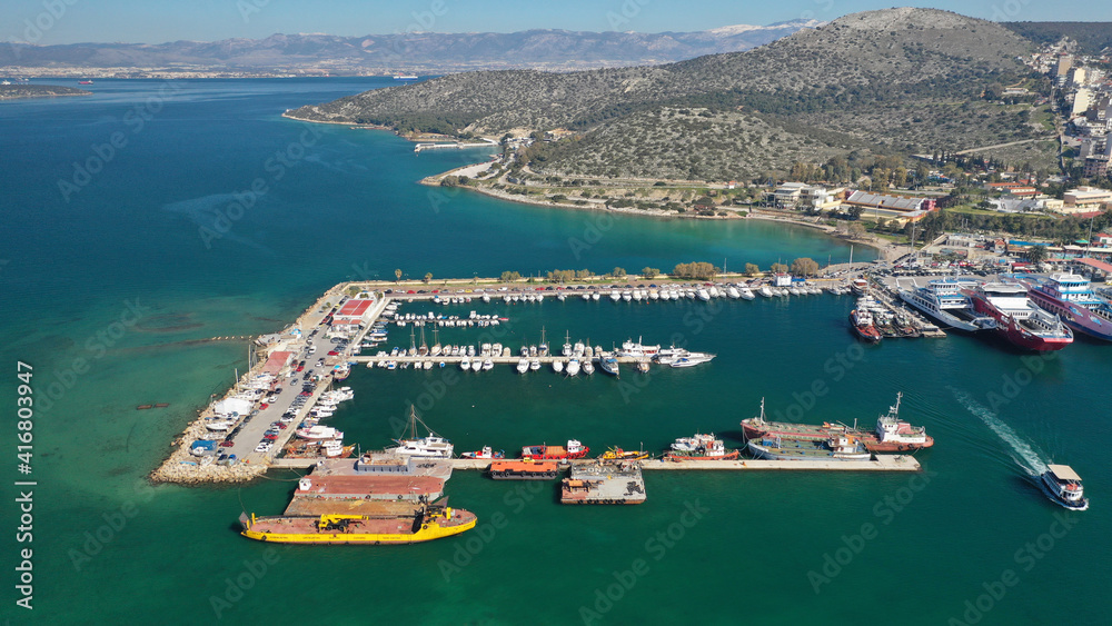 Aerial drone photo of small port next to shipyard and ship repair area of Perama next to island of Salamina, Attica, Greece