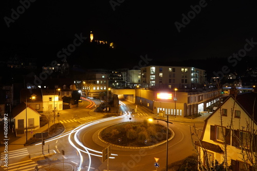 Night view of the town with ruins in a background
