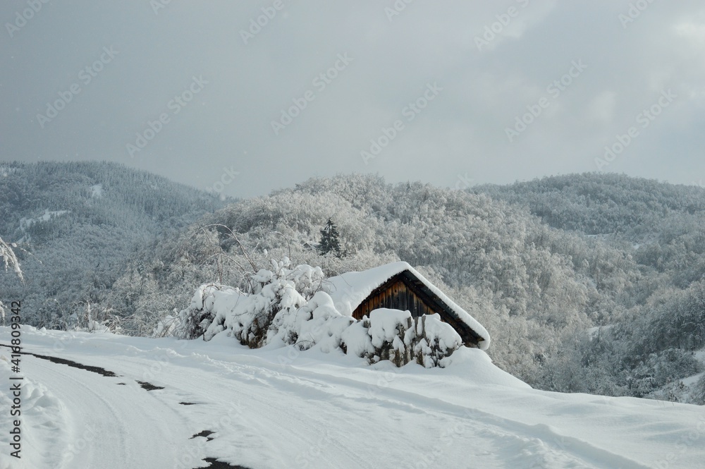 mountain house in the snow in winter