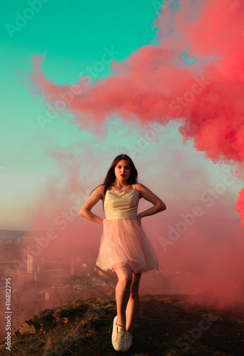 Beauty girl colored smoke