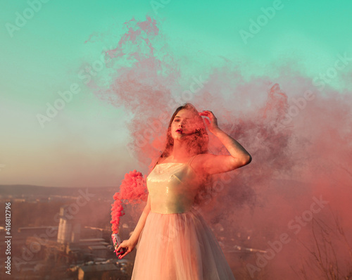Beauty girl colored smoke
