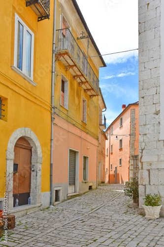 Fototapeta Naklejka Na Ścianę i Meble -  A street among the colorful houses of Frosolone, an old town in the Molise region, Italy.