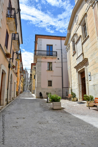 A street among the colorful houses of Frosolone  an old town in the Molise region  Italy.
