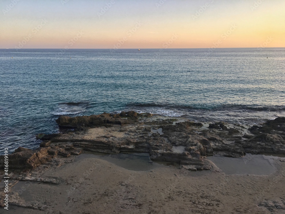 Mediterranean beach with no people at sunset. Mediterranean beach with no people at sunset.