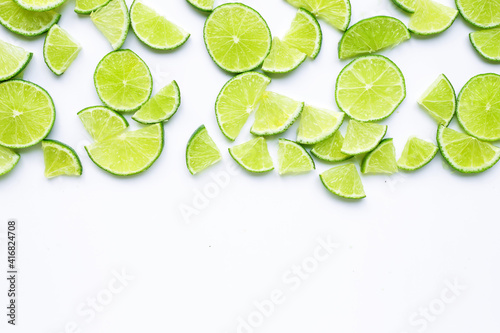 Lime slices on white background.