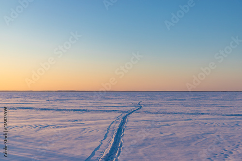 Sunset view of Lake Chukhloma. Winter time. Kostroma region.