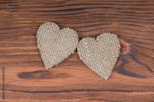 Two hearts from burlap fabric texture. Creative love  linen wedding  valentine s day