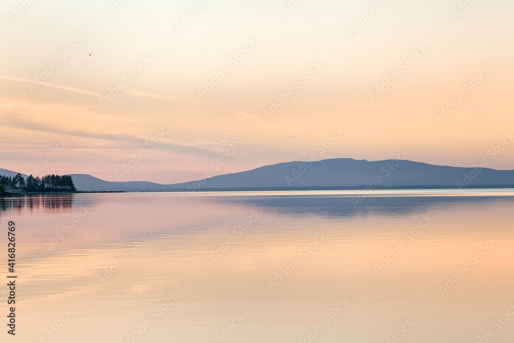 Fototapeta premium A fascinating party landscape for meditation. Calm on the lake, Kola Peninsula Tersky District lake kolvitsa.
