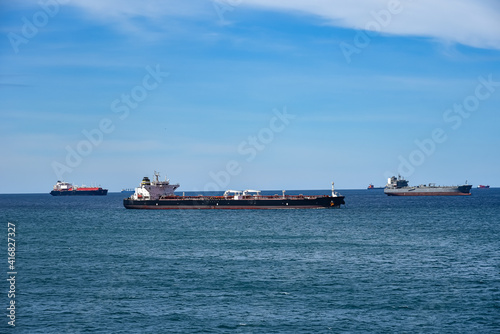 Seascape panorama view with anchored ships.